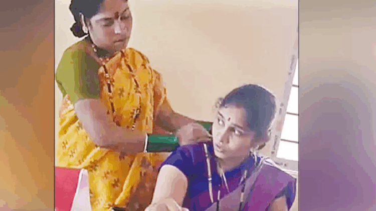 ஊழியரை மிரட்டி மசாஜ் செய்ய வைத்த தலைமை ஆசிரியர்..!! வீடியோ வைரல்..!!
